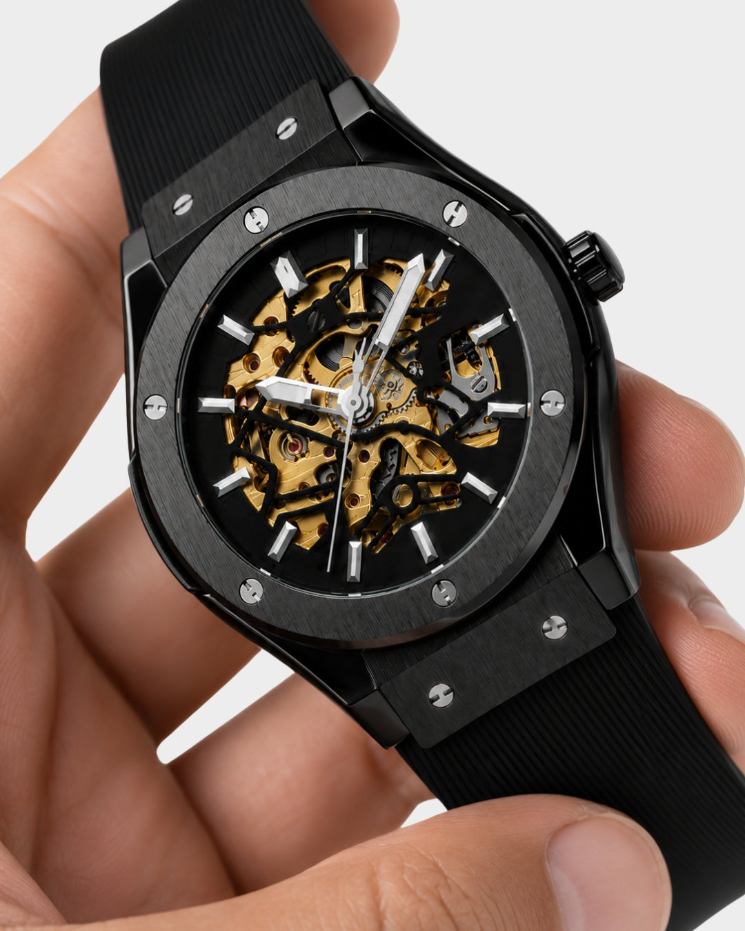 Image of William Corbier MACH Onyx men's automatic skeleton watch, held in a hand