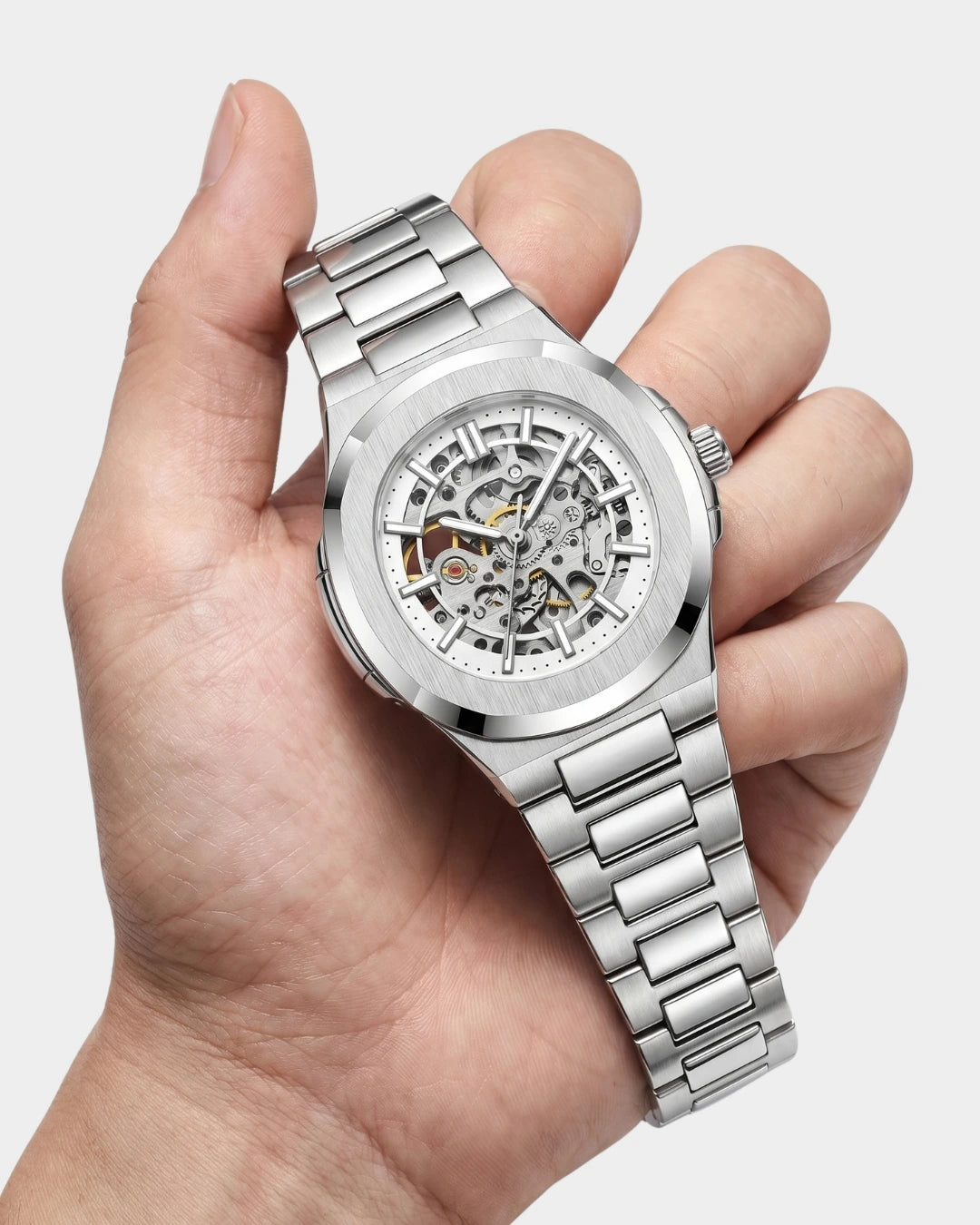 Image of William Corbier PIVOT Alpine men's automatic skeleton watch, held in a hand