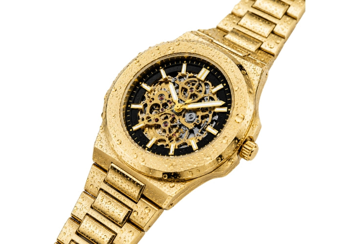 Image of William Corbier PIVOT Imperial Gold men's automatic skeleton watch, angled front view