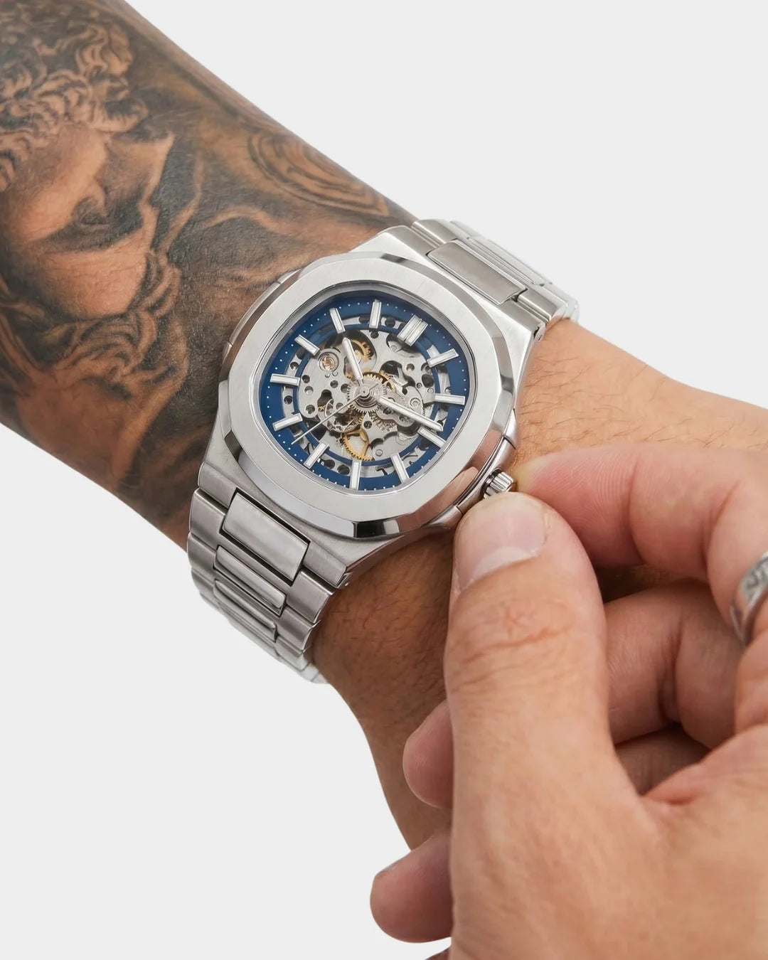 William Corbier PIVOT Silver Mist men's automatic skeleton watch, being fastened on the wrist