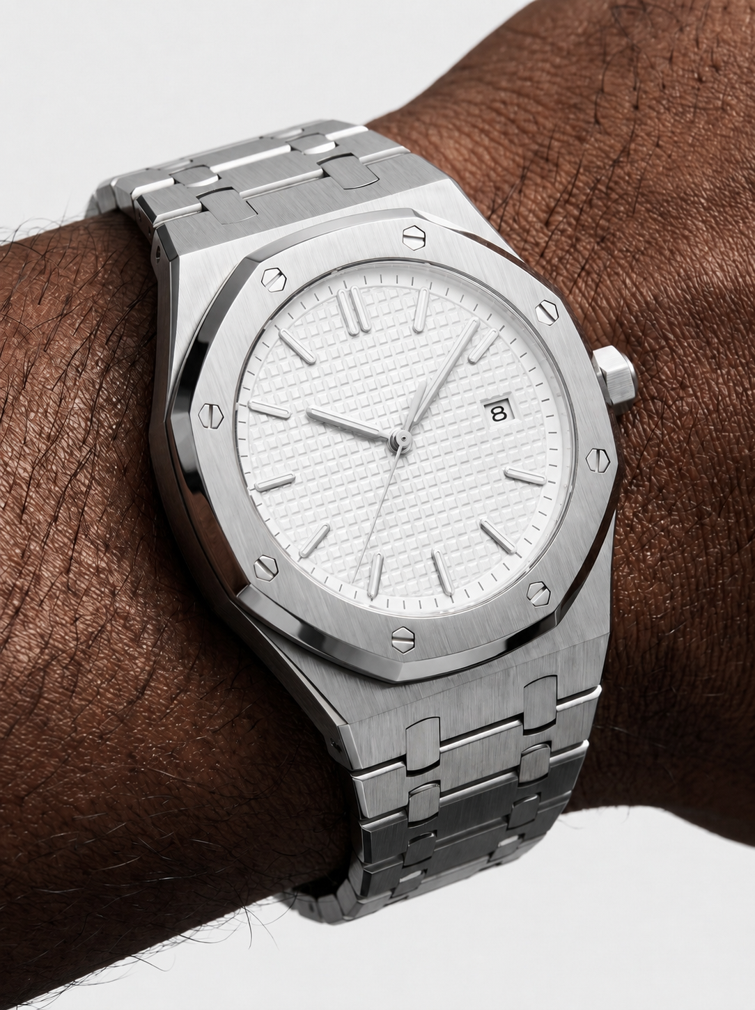 William Corbier RIDGE Alpine men's white dial steel watch, worn on a wrist close-up on a dark-skinned wrist