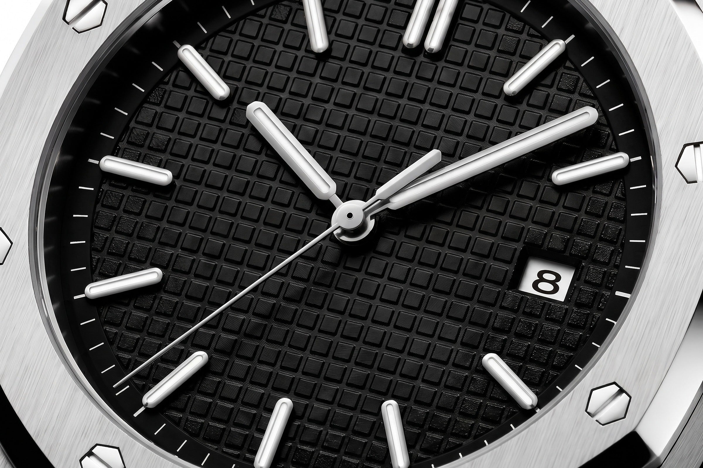Image of Close-up of the black textured dial of a William Corbier RIDGE Onyx men's steel watch with date window